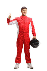 Car racer in a suit showing thumbs up © Ljupco Smokovski