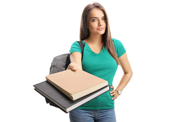 Female student giving books