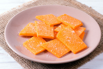 Sliced pumpkin with salt on a plate