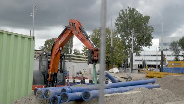 An excavator at heavy renovations at Amstel Station in Amsterdam.