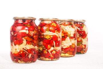collection set of canned vegetables in glass jars isolated on white background