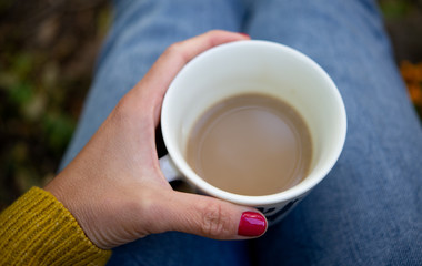A cup of coffee in hand 