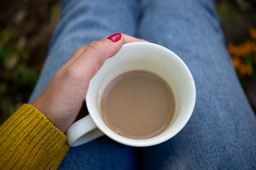 A cup of coffee in hand 