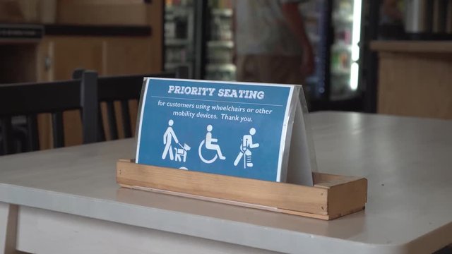 Priority seating sign in a restaurant