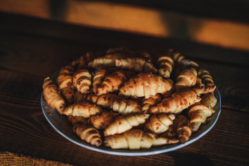 Mini croissants in a plate. 