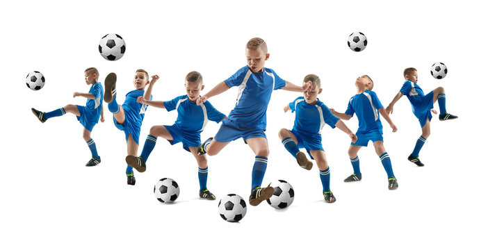 Young boy with soccer ball doing flying kick, isolated on white. football soccer players in motion on studio background. Fit jumping boy in action, jump, movement at game. Collage