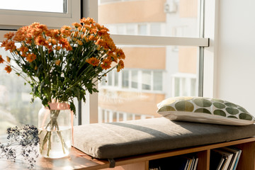 close up view of beautiful bouquet of flowers at window at home