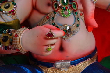 Closeup of hand of Hindu elephant headed God Ganesha Idol during Ganesha Chathurthi