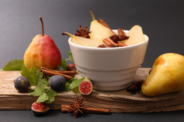 poached pear with syrup and spices