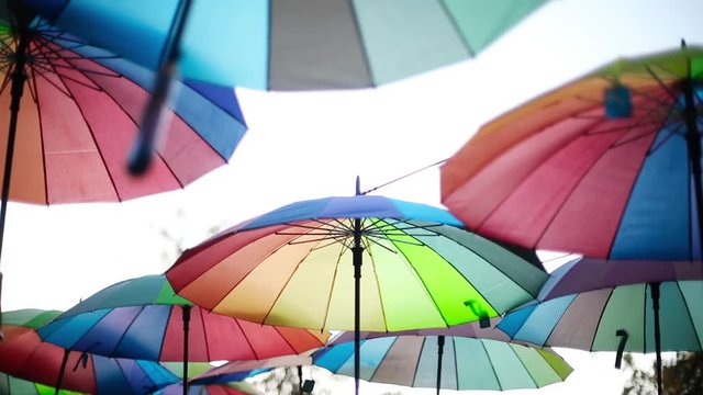 Close up footage of some multicolored umbrellas.