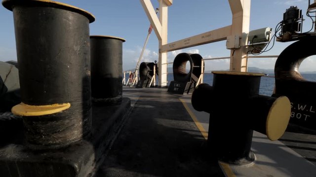 Bollards and hawse on aft mooring station of ship