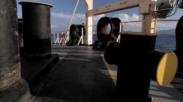 Bollards and hawse on aft mooring station of ship
