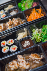 Macro picture of a bento box in a Japanese restaurant. Макро фотография бенто коробки в японском ресторане.