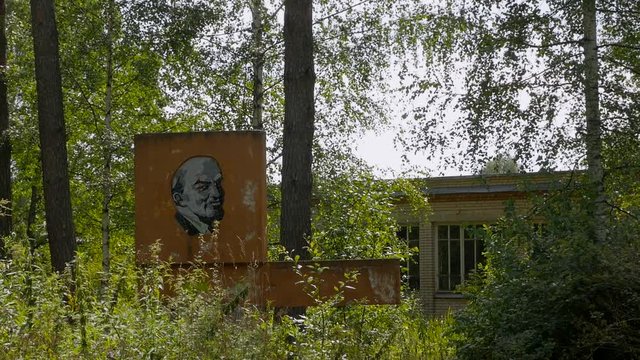 image of Lenin among a grassy area.