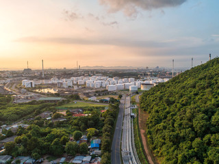 Industrial view at oil refinery plant form industry zone with sunrise and cloudy sky.Oil refinery...