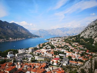 Fototapeta na wymiar Stunning Scenic Views from Various Stages of Climb up the Castle of San Giovanni in Kotor Montenegro containing Blue Sea and Mountain Views
