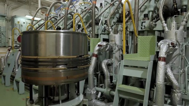 New piston close to diesel engine of ship