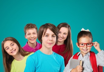 Friendly school children studying concept  on background