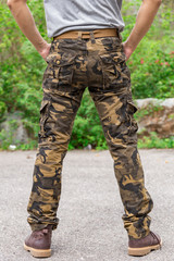 Model wearing cargo pants or cargo trousers