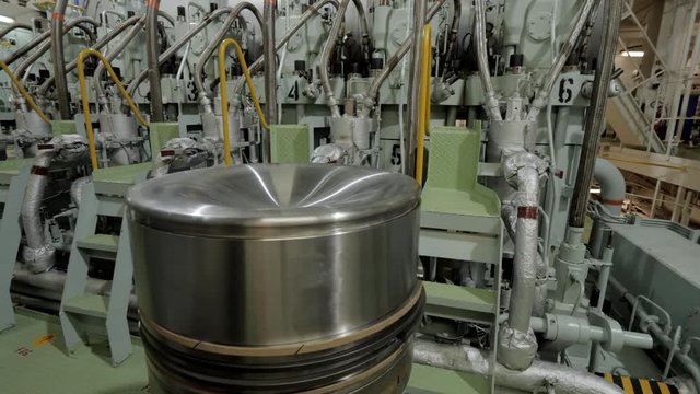 New piston near diesel engine of ship
