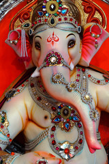 Closeup of Indian God Ganesha Idol,people offer prayers during Ganesh Chathurthi,annual festival