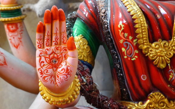  Closeup of Hand of Hindu goddess Parvati i,in blessing pose,in a temple