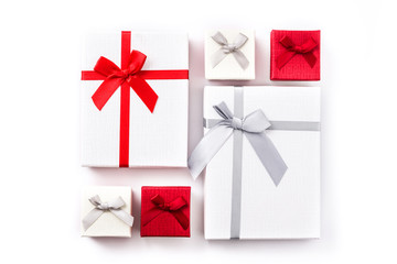 White and red gift boxes isolated on white background. Top view.