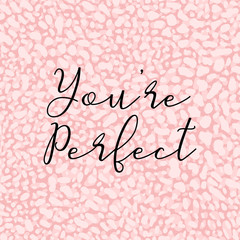 You're Perfect beautiful slogan, fashion poster, card, shirt. Typography illustration with peachy pink color animal skin pattern. Vector background