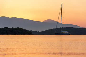 Yacht on sea water surface.