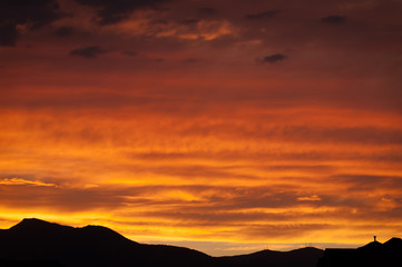 A dramatic and deep orange sunset in Salt Lake City.