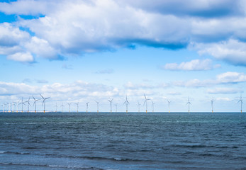 Offshore Wind Turbine in a Wind farm under construction off the England coast