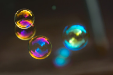 Closeup of a group of colorful soap bubbles