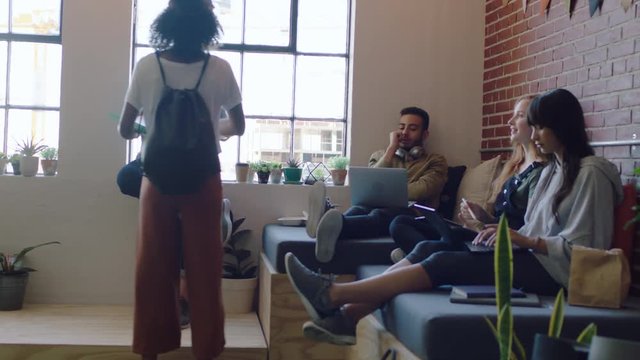 young diverse business people brainstorming colleague woman sharing corporate proposal documents creative team working together meeting in modern office workplace