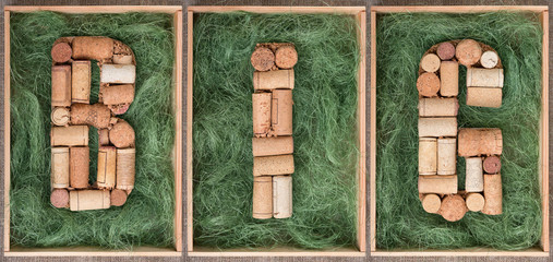 Word Big made of wine corks on green background in wooden box Seamless  Banner