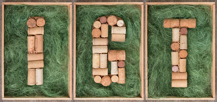 Classification Italian wines IGT (protected geographical indication) made of wine corks on green background in wooden box Seamless  Banner