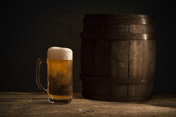 Glasses of light beer with barley on a pub background