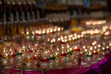Candles Lit during a ceremony inside the Tooth Relic temple in Singapore