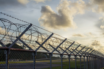 Fototapeta premium Background War Net Barrier Barbed Wire Conflict in Phuket Thailand