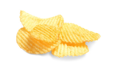 Tasty ridged potato chips on white background