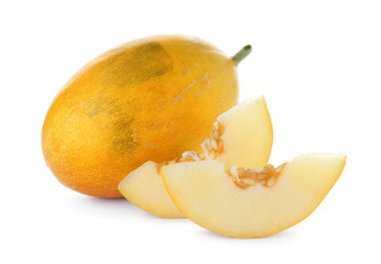 Whole and sliced tasty ripe melons on white background