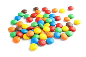Pile of colorful candies on white background