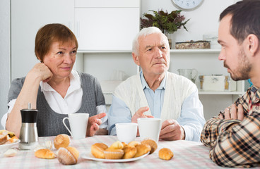 Parents arguing with son