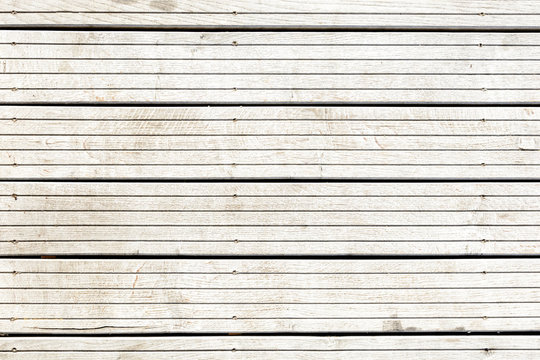 Grey teak wooden floor texture background.