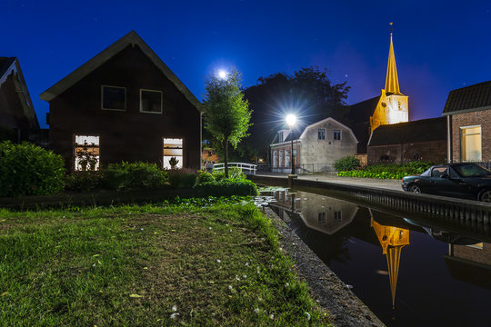 Dutch village Zoeterwoude-dorp during dusk