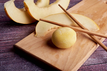 The colorful mochi dessert ice cream on wood plate