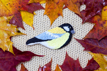 Embroidery brooch on autumn theme, and maple leaves