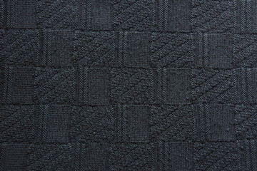 warm gray woolen sweater fabric texture background wool close-up.
