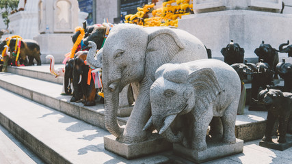 wooden statues of elephants close-up