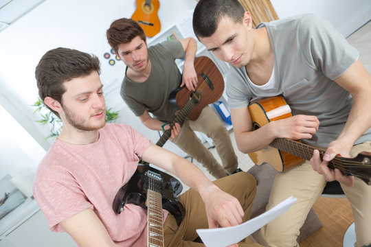 music band rehearsing at home