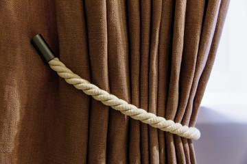 tied curtains cord